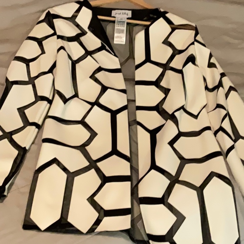 NWOT JOSEPH RIBKOFF faux leather geometric laser cut jacket in white/black